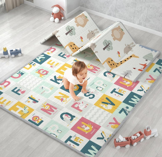 Folding Foam Baby Play Mat. Extra Thick. 2 Sided. Give your baby a safe and fun playtime—order your Folding Foam Baby Play Mat today!