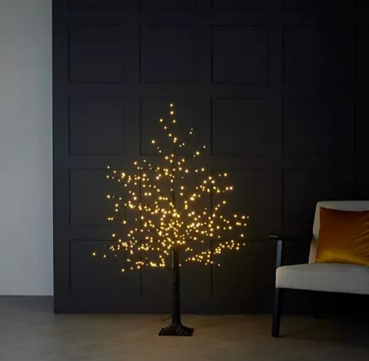 HOME REFLECTION Multifunction 5 ft Black Led Tree. Transform your home into a modern paradise—grab your 5 ft Black LED Tree today!