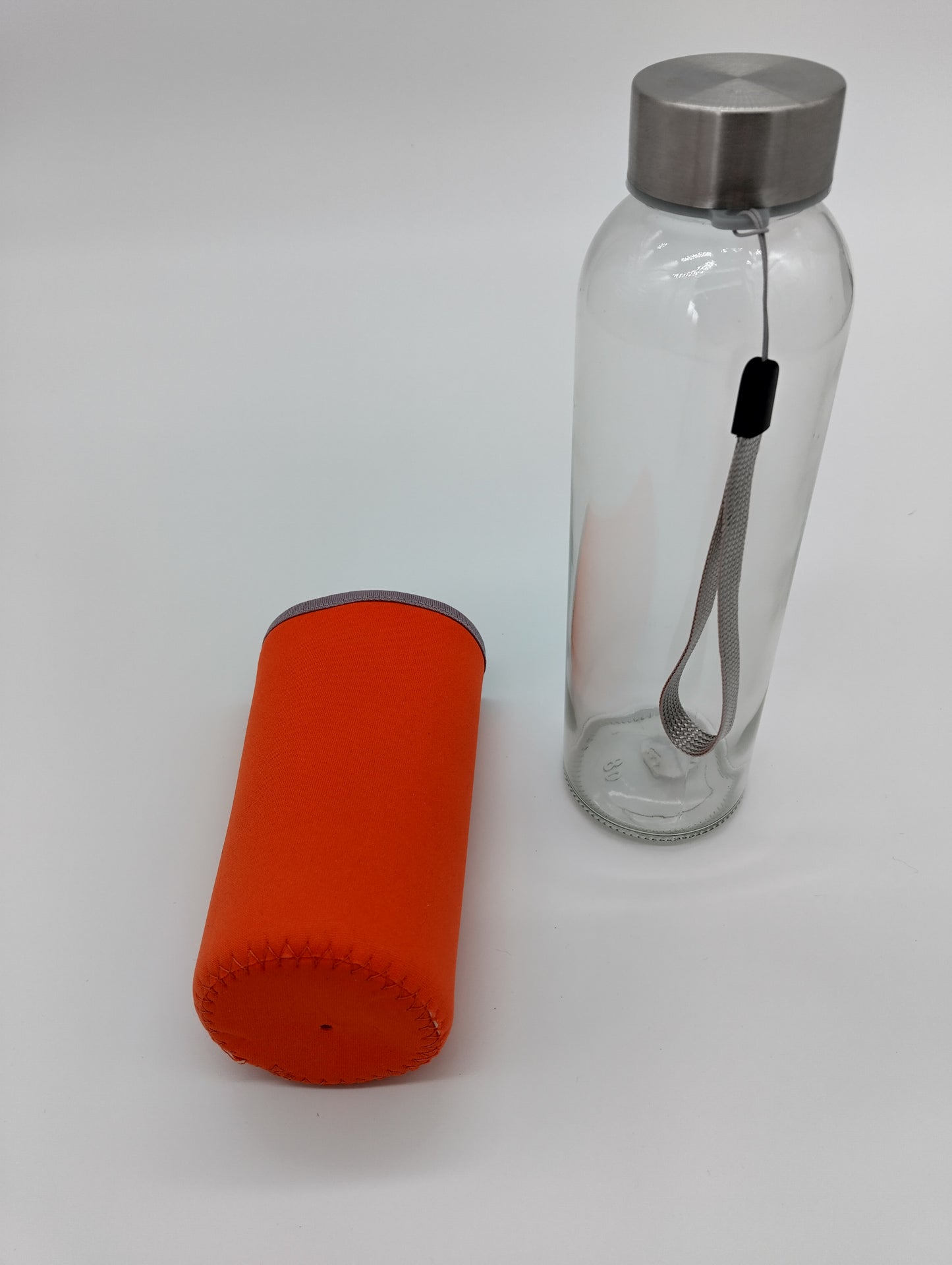 Glass Drinking Bottle. 420ml. Hydrate in style with this Clear Glass Drinking Bottle. Perfect for gym, office, or travel