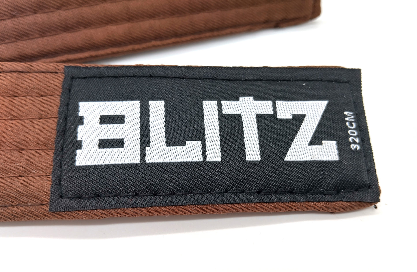 BLITZ Plain Coloured Lightweight Belt. Brown.  Enhance your martial arts training with the BLITZ Plain Coloured Lightweight Belt.    320cm.