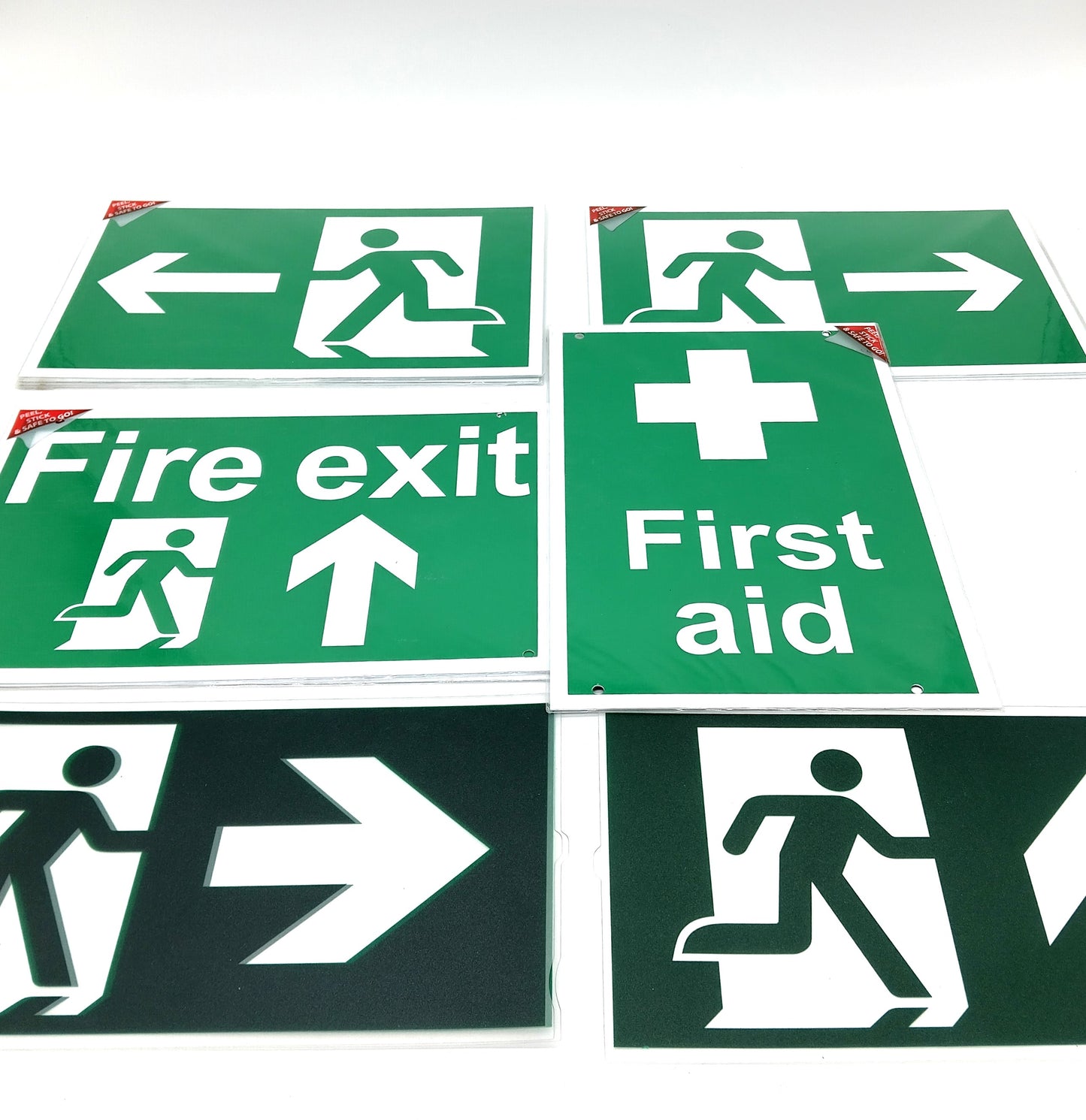 V Safety Fire Exit. 18 Pcs. These essential signs provide clear directions and enhance the safety of any environment.