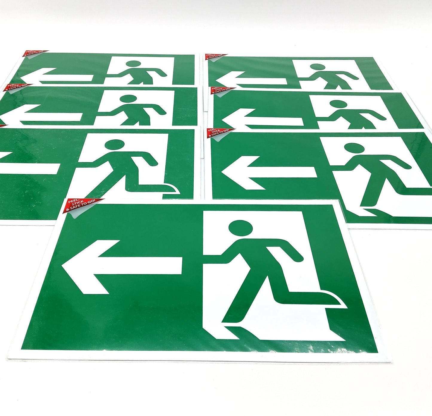 V Safety Fire Exit. 18 Pcs. These essential signs provide clear directions and enhance the safety of any environment.