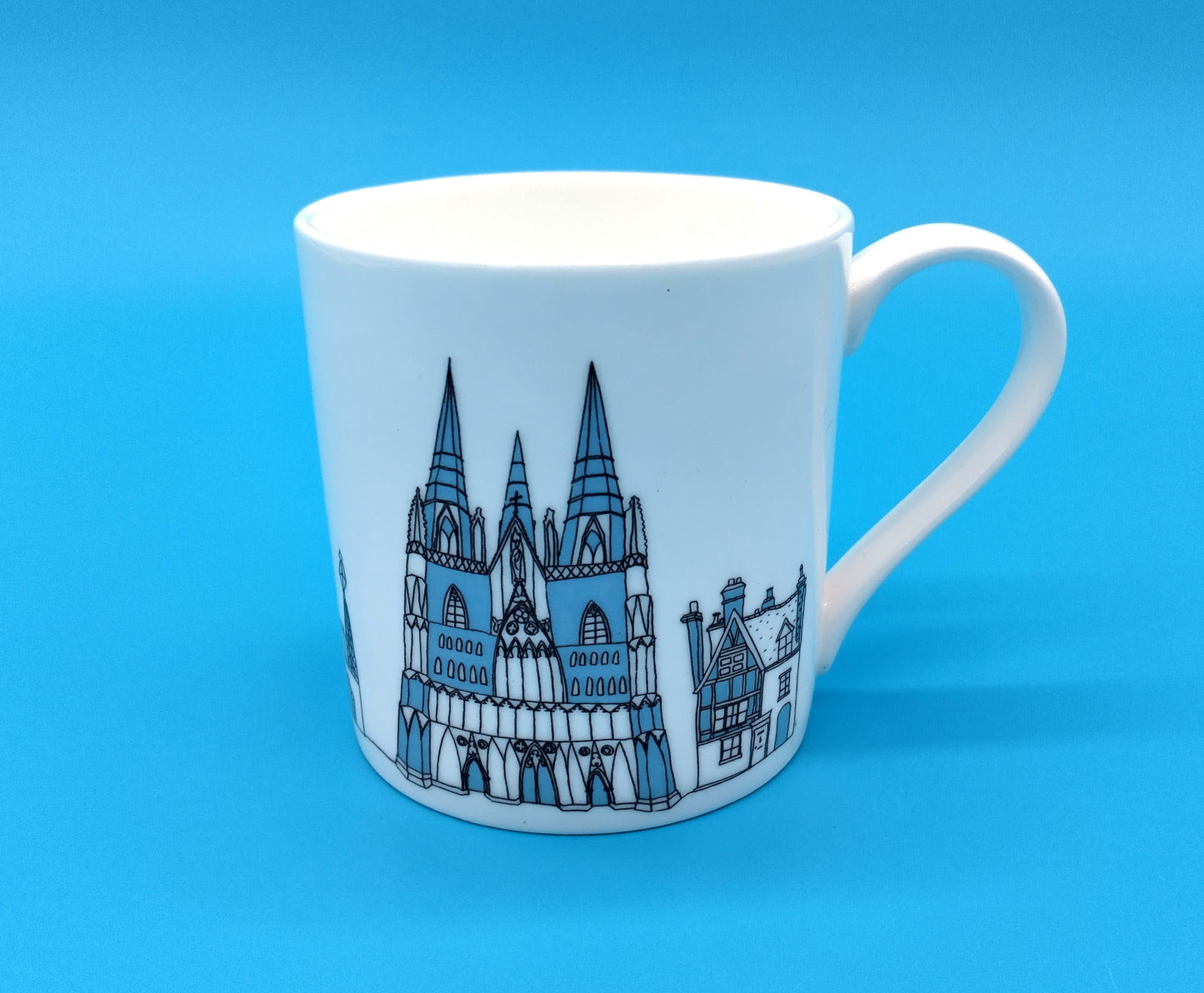 Mandy Billington Mug. White-Blue. Elevate your drinking experience with the stylish and durable Mandy Billington Mug.