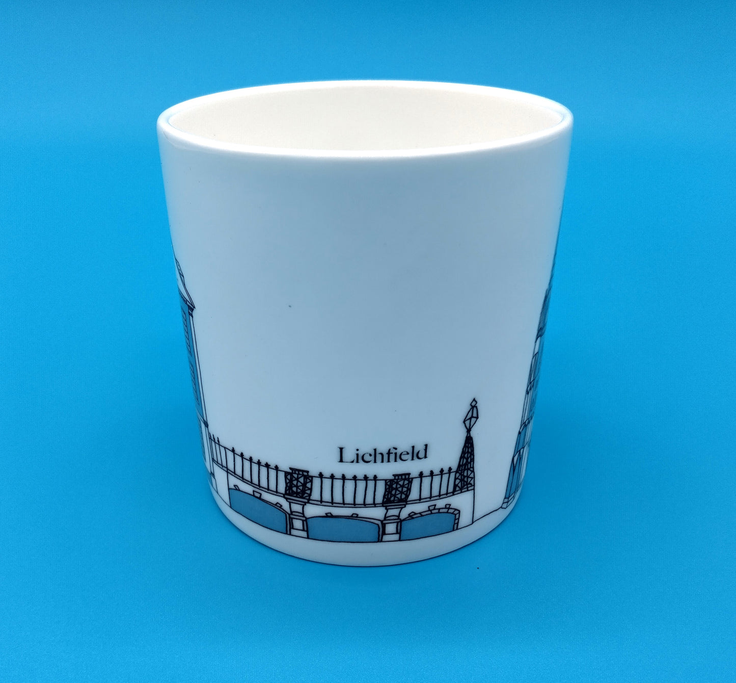 Mandy Billington Mug. White-Blue. Elevate your drinking experience with the stylish and durable Mandy Billington Mug.