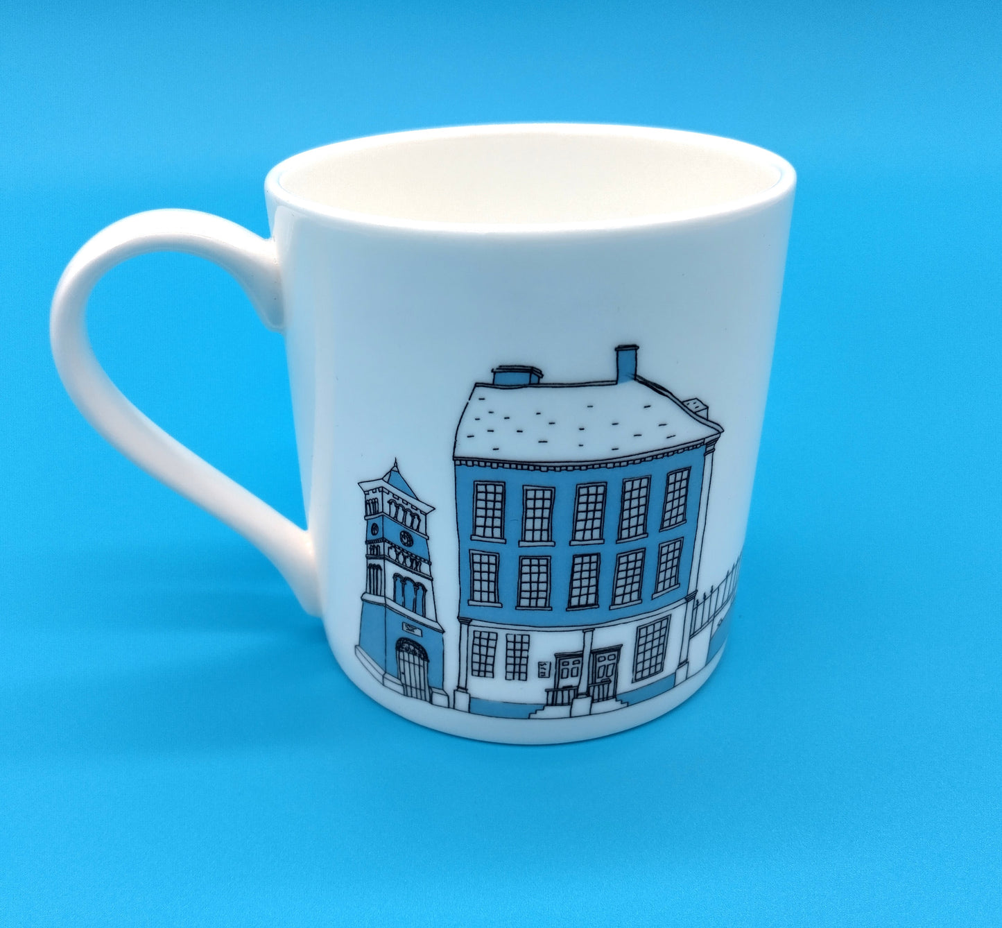 Mandy Billington Mug. White-Blue. Elevate your drinking experience with the stylish and durable Mandy Billington Mug.