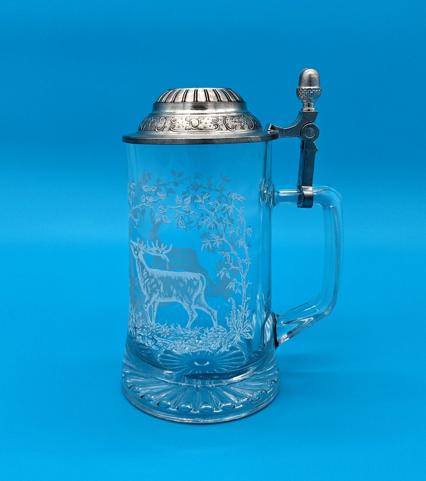 German Etched Glass Beer Stein. Add a touch of elegance to your beer-drinking experience with the German Etched Glass Beer Stein.