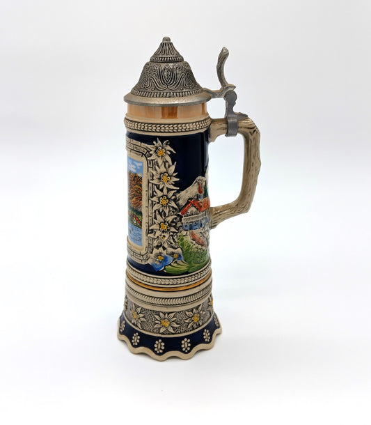 German Porcelain Pewter Beer Stein Mug with Music Box. Enhance your collection and beer-drinking experience with the German Porcelain Pewter Beer