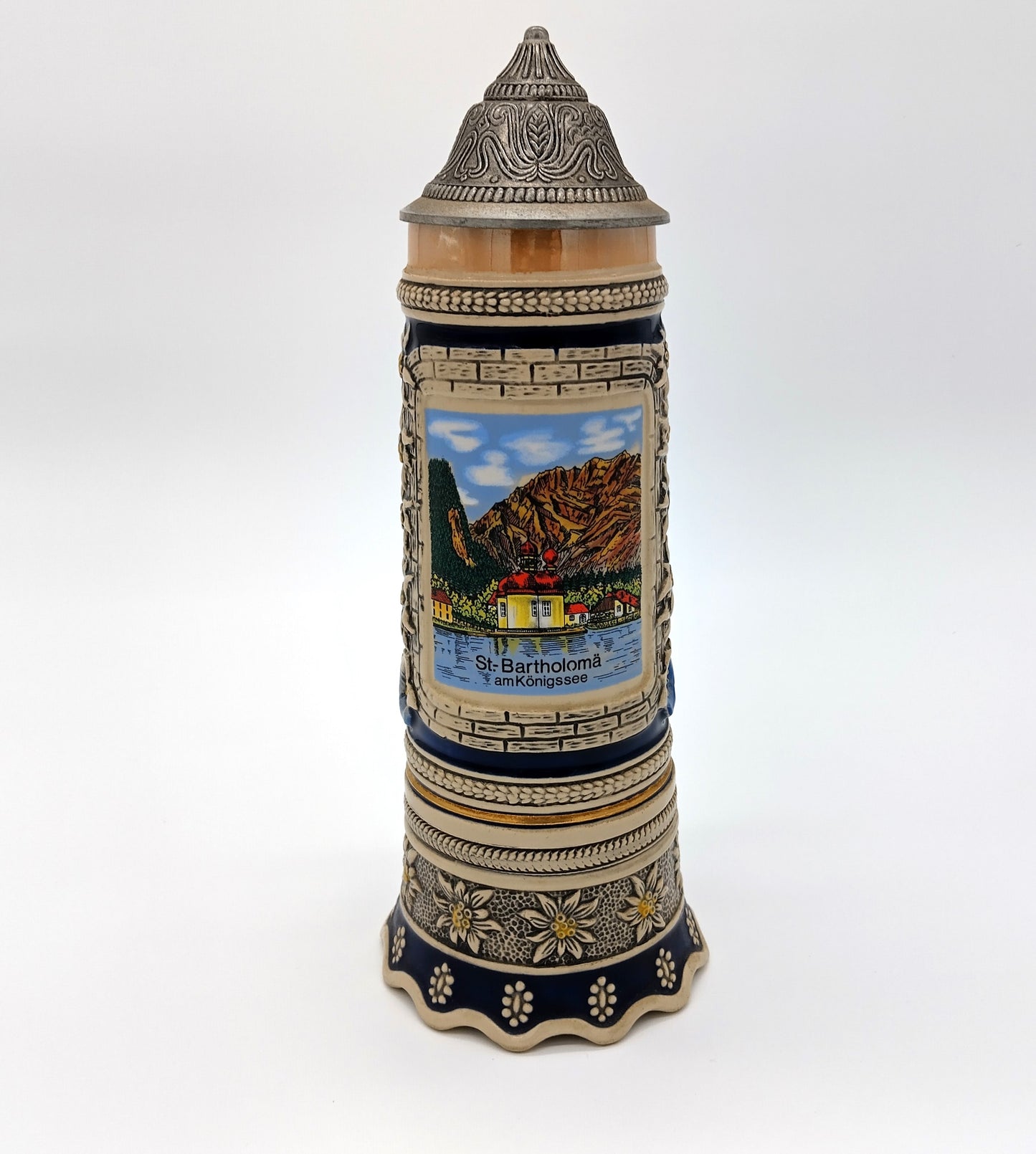 German Porcelain Pewter Beer Stein Mug with Music Box. Enhance your collection and beer-drinking experience with the German Porcelain Pewter Beer