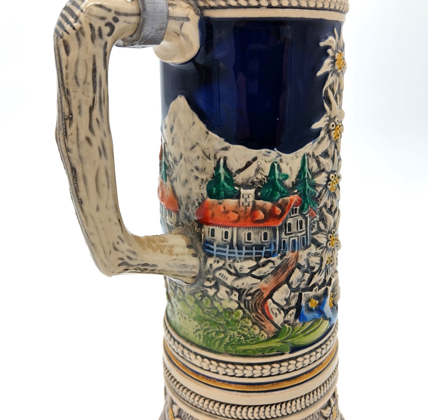 German Porcelain Pewter Beer Stein Mug with Music Box. Enhance your collection and beer-drinking experience with the German Porcelain Pewter Beer