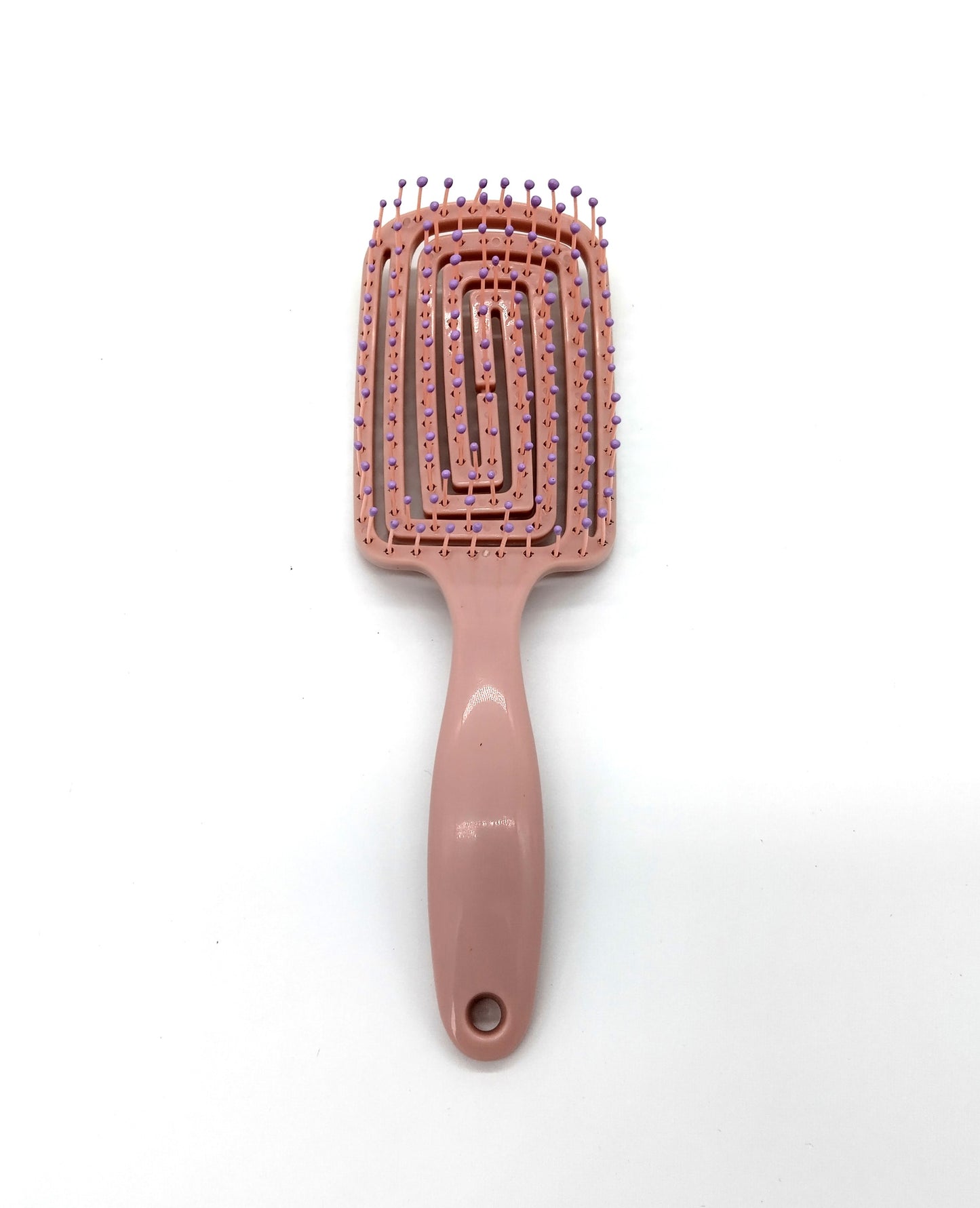 Hair Brush. Enhance your hair care routine with the Detangle Hair Brush.