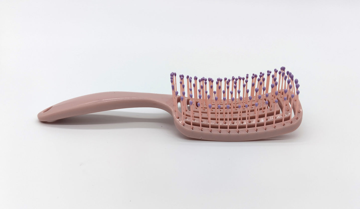 Hair Brush. Enhance your hair care routine with the Detangle Hair Brush.