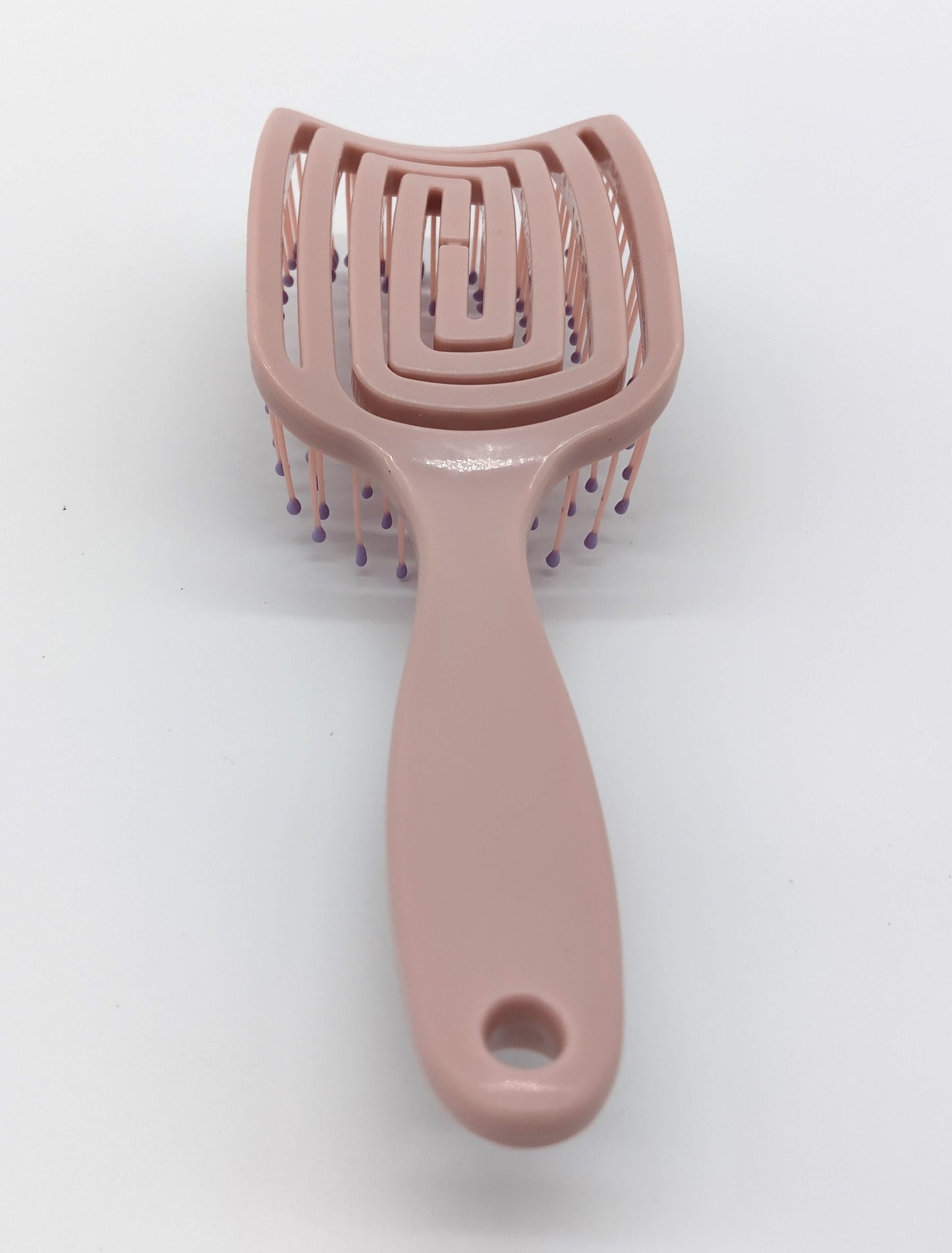 Hair Brush. Enhance your hair care routine with the Detangle Hair Brush.