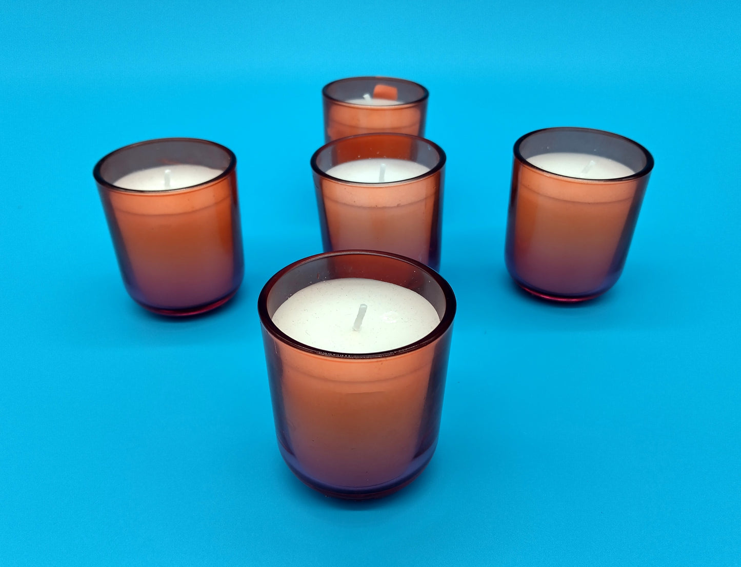 Glass Candles. 5 Pcs. Enhance your decor with the elegant glow of these Glass Candles.