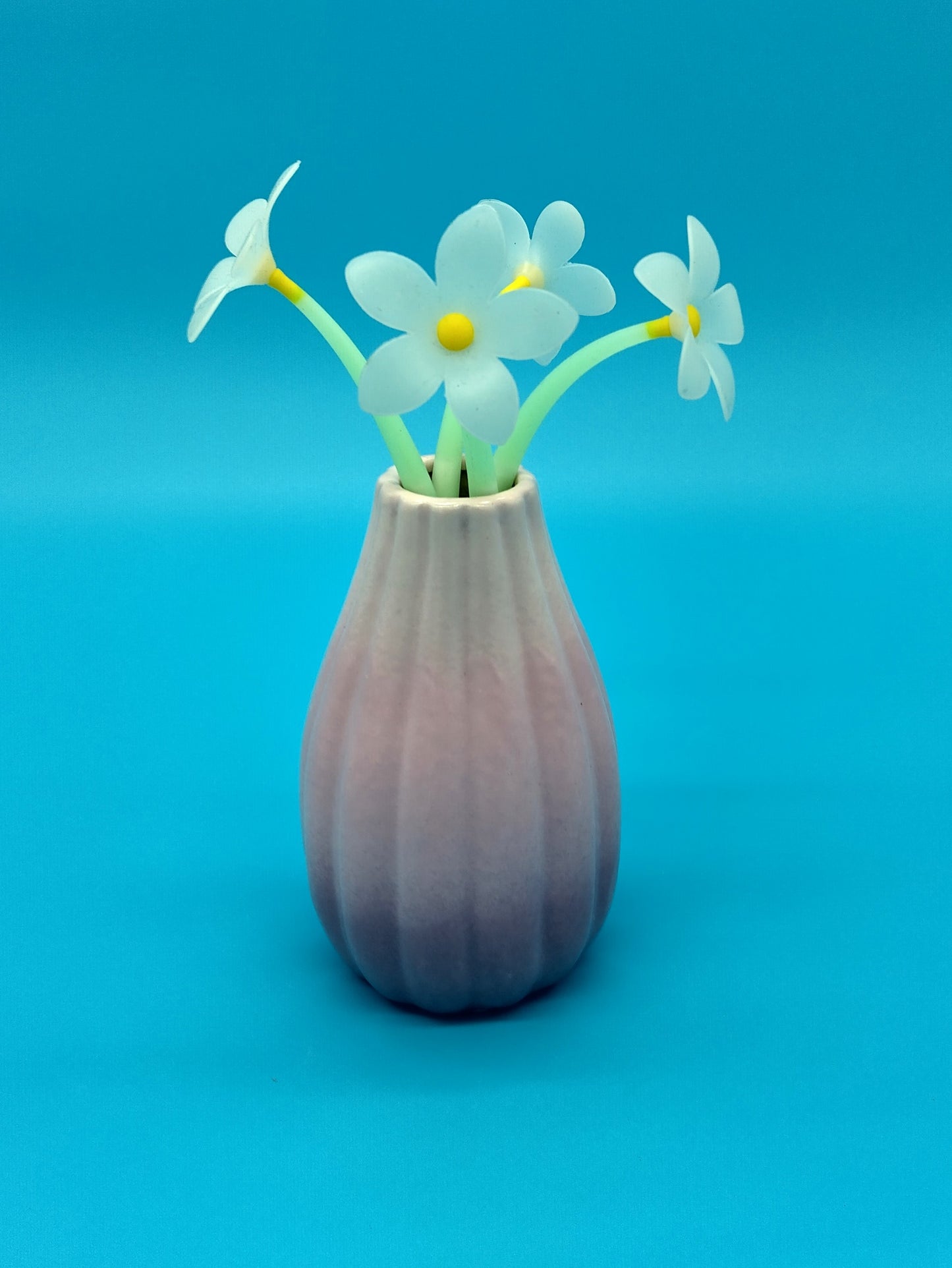 Small Vase with Silicone Flowers. Perfect for adding a touch of elegance and natural beauty to any space.