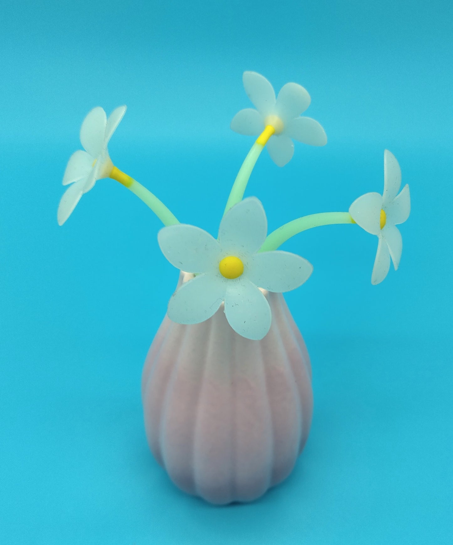 Small Vase with Silicone Flowers. Perfect for adding a touch of elegance and natural beauty to any space.