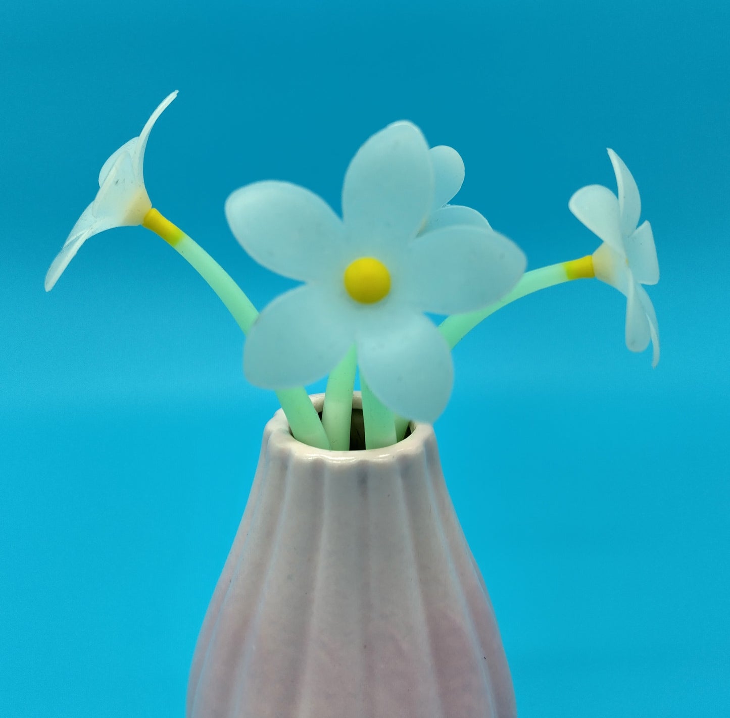 Small Vase with Silicone Flowers. Perfect for adding a touch of elegance and natural beauty to any space.