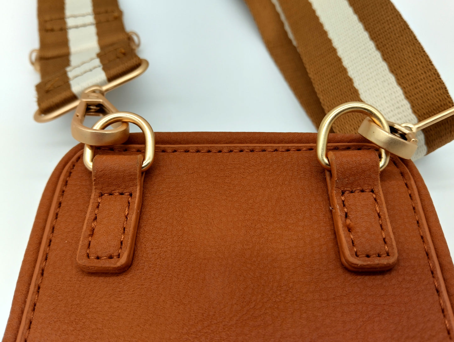 Cross Body Bag. Brown. Enhance your daily routine with the Women's Cross Body Bag.