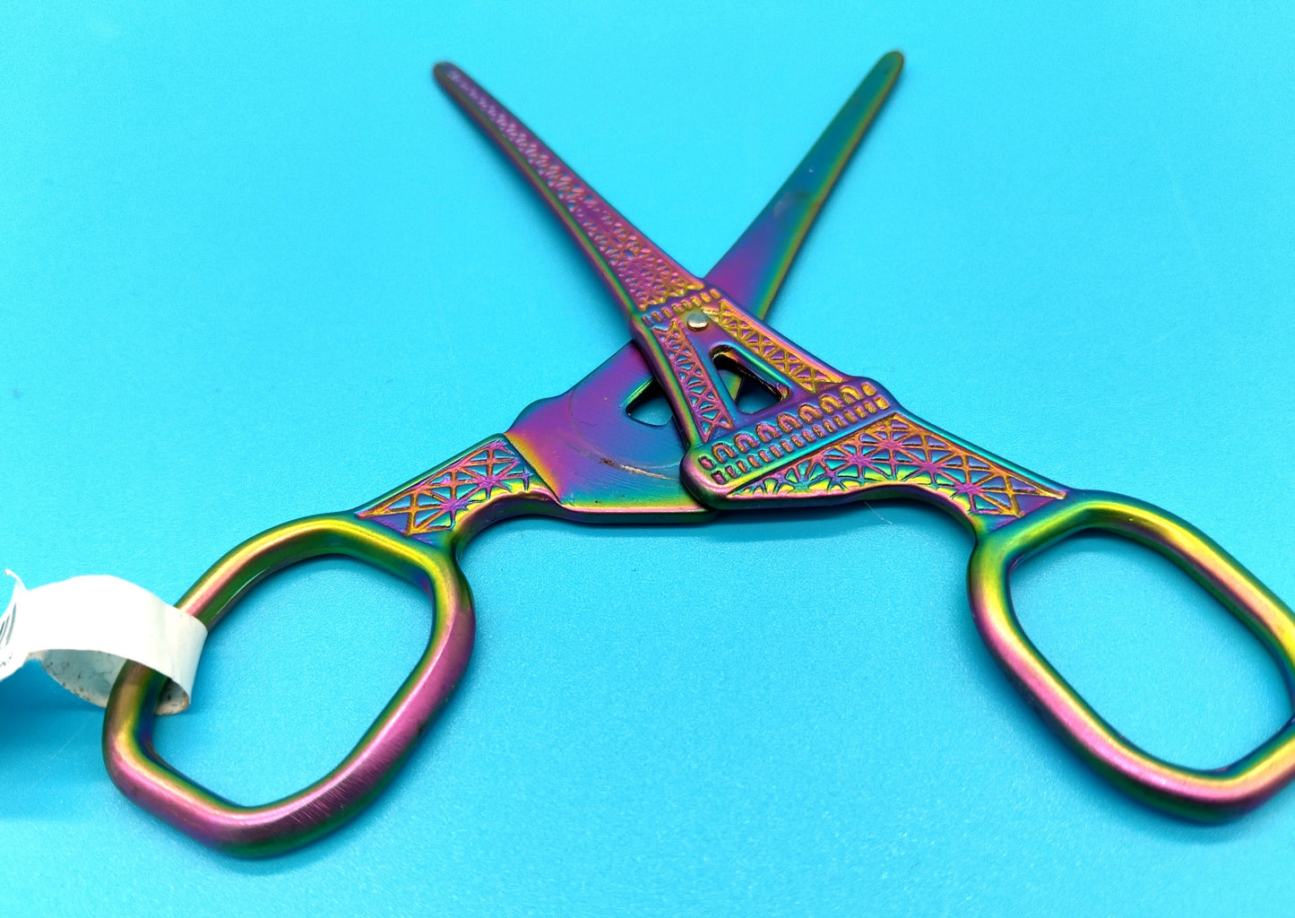 Eiffel Tower Scissors. Add a touch of elegance to your craft projects with our Eiffel Tower Shaped Stainless Steel Embroidery Scissors.