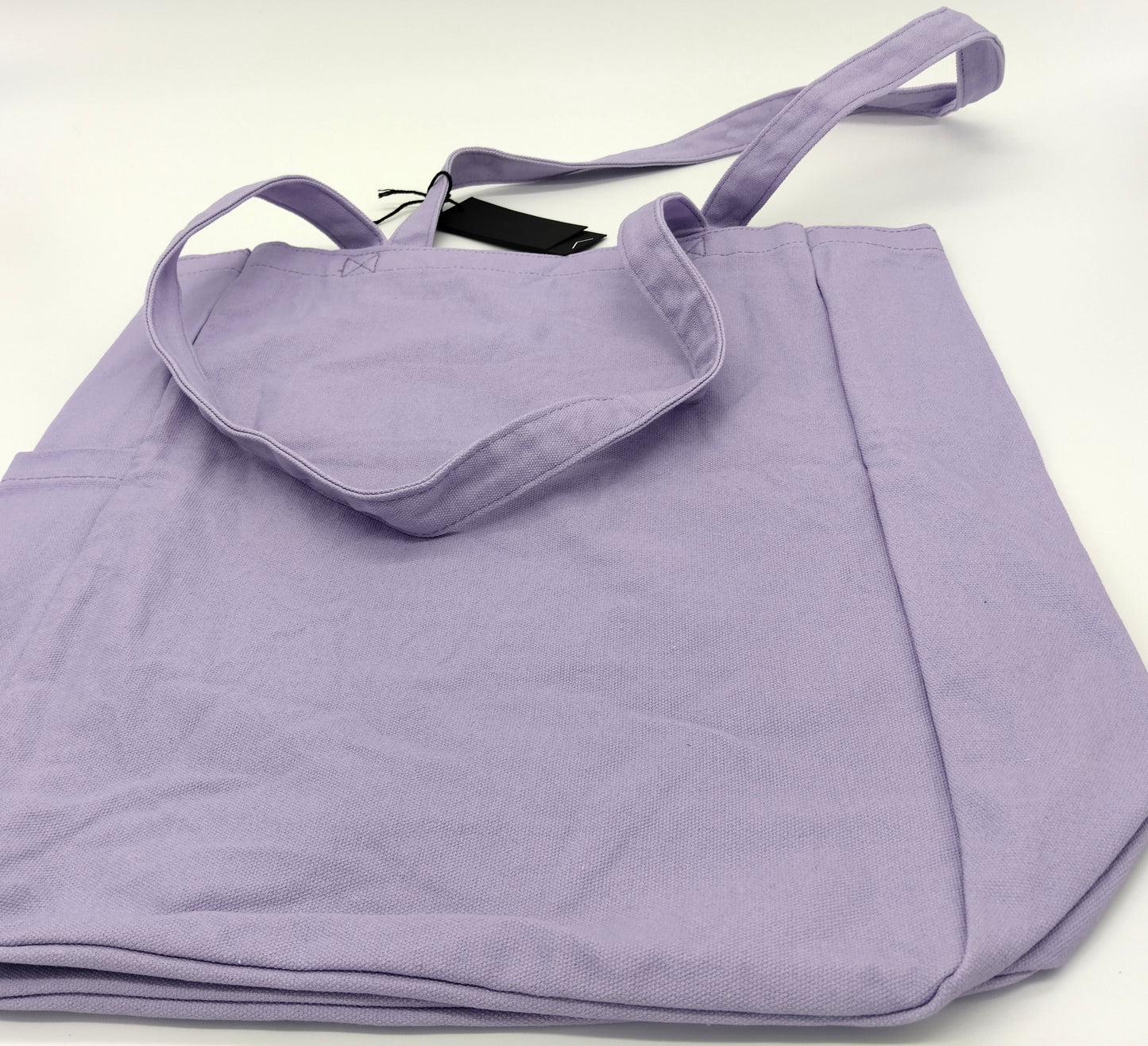 Solid Cotton Bag. Perfect for any occasion, it combines durability, spaciousness, and style in one convenient bag.