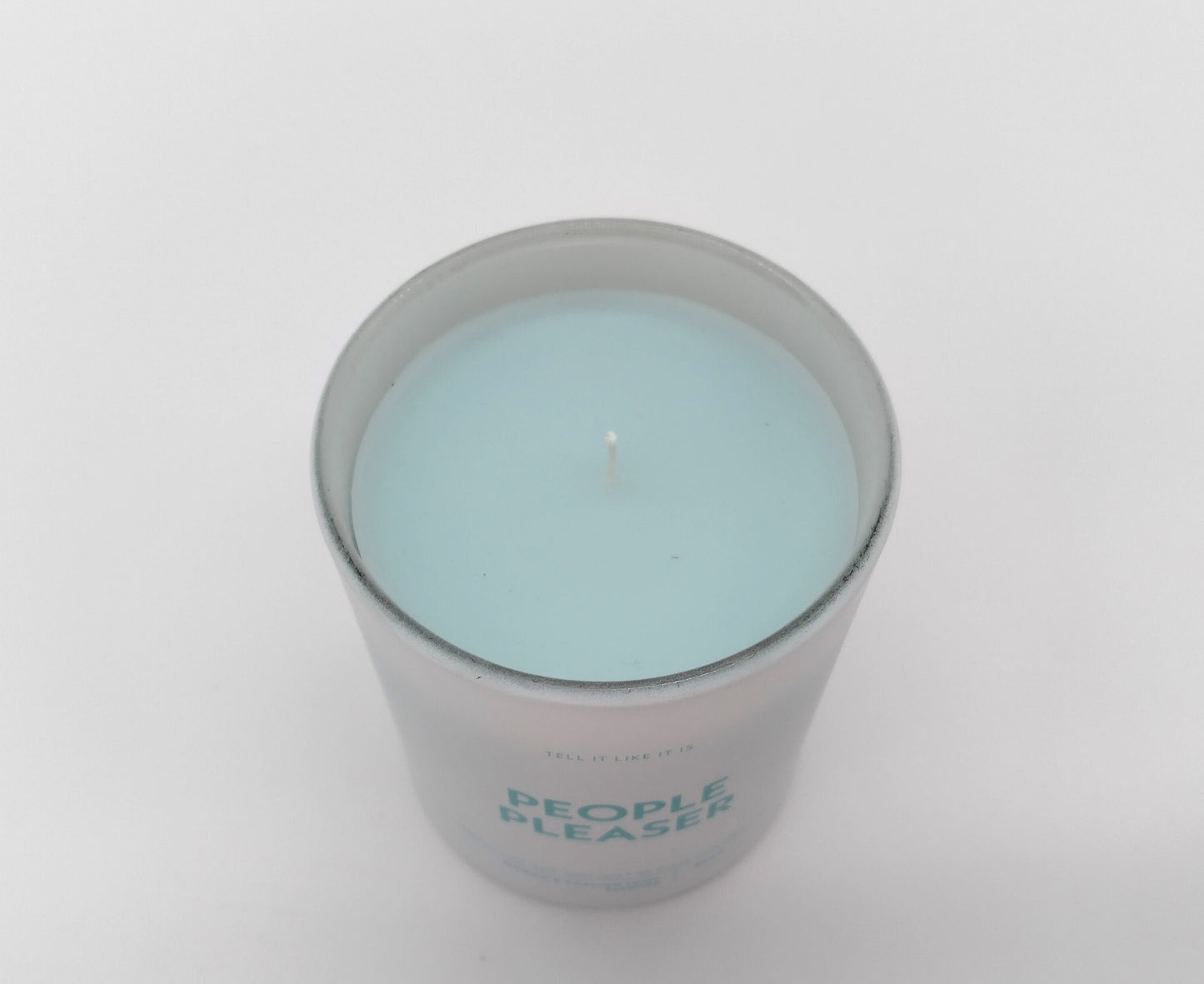 Tell It Like It Is. Candle. Artic Blue. With its long-lasting burn time, elegant design, and soothing scent, it's the perfect addition to any space.