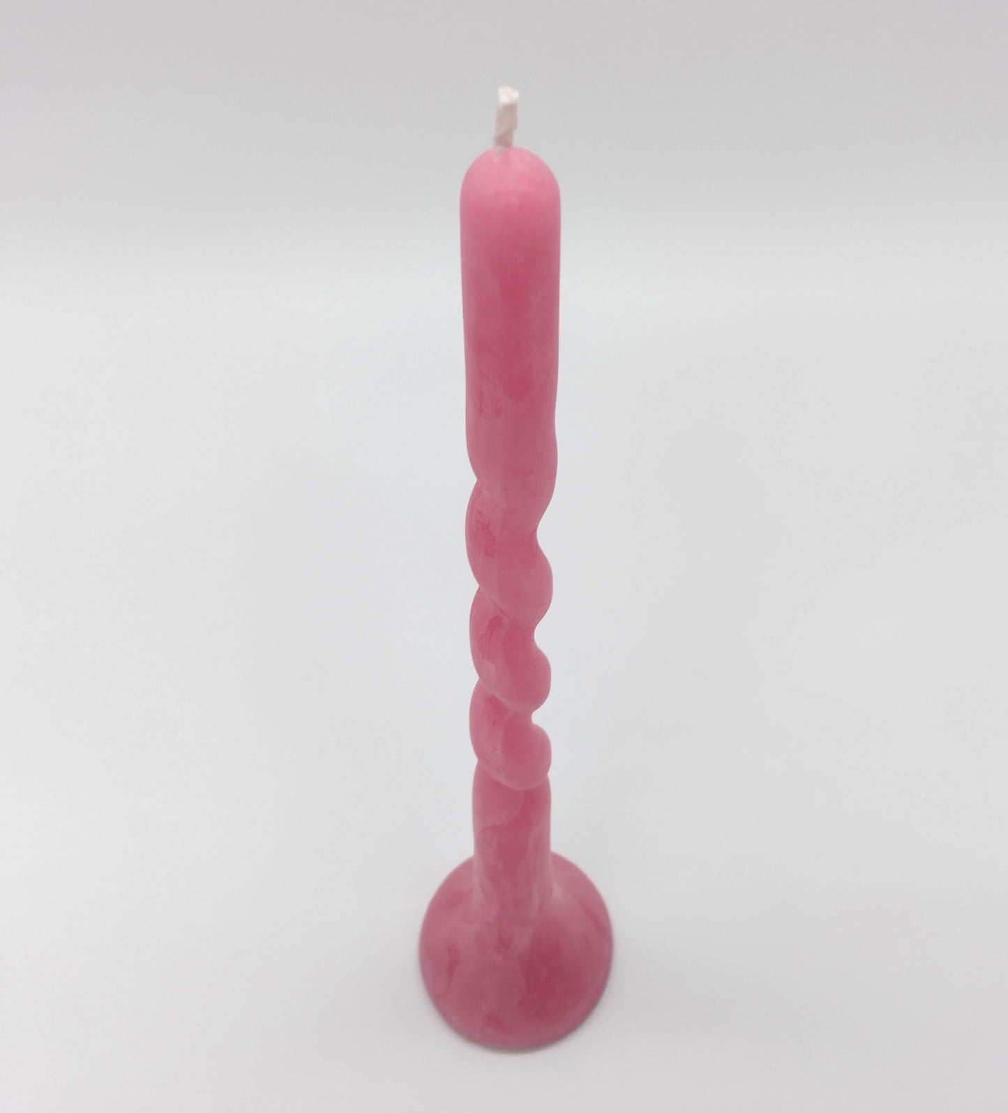 Twist Candle. Rosa Powder Twist. Height 31cm. Perfect for adding a decorative touch and creating a warm, inviting atmosphere.