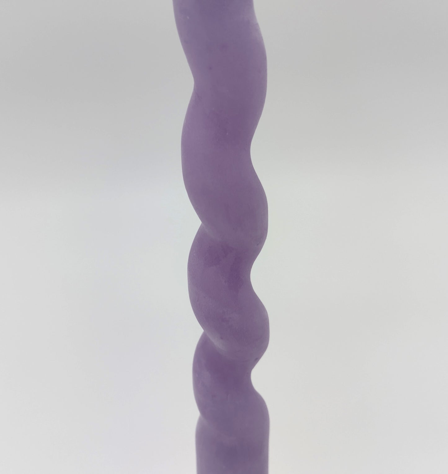 Twist Candle. Pale Lilac Twist. Height 31cm. Perfect for adding a decorative touch and creating a warm, inviting atmosphere.