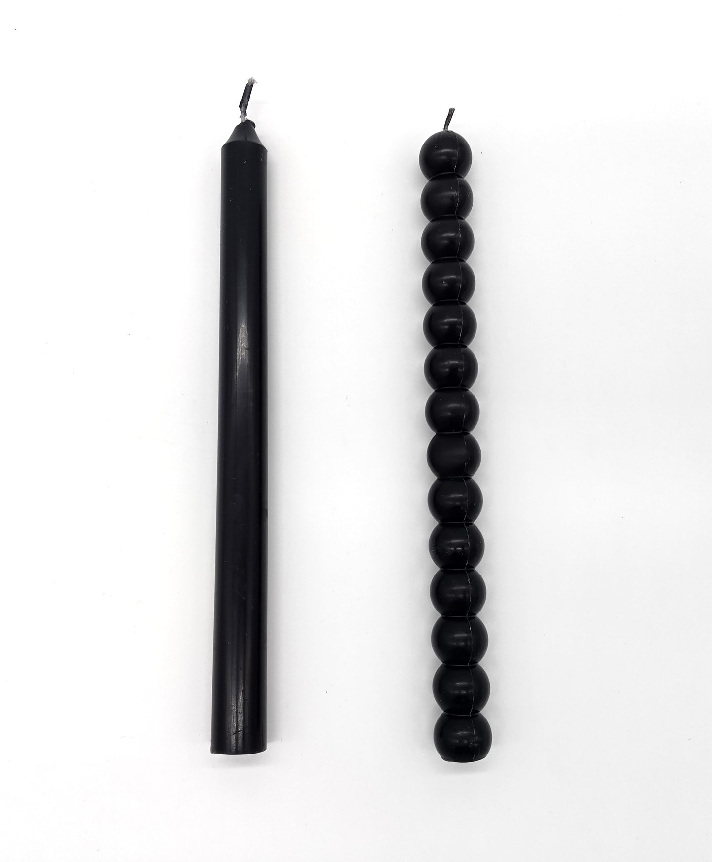 Candle Sticks. Add a touch of elegance and warmth to your home with our Black Candle Sticks.