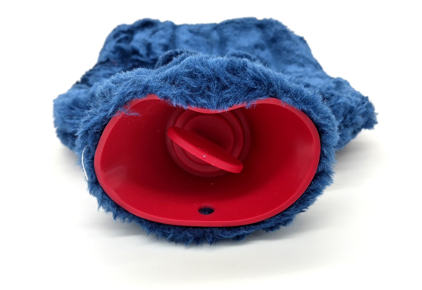 Cosy Faux Fur Hot Water Bottle. 2L.  Transform your cold nights into a warm, cosy haven with the Luxury Cosy Faux Fur Pom Pom Hot Water Bottle. W