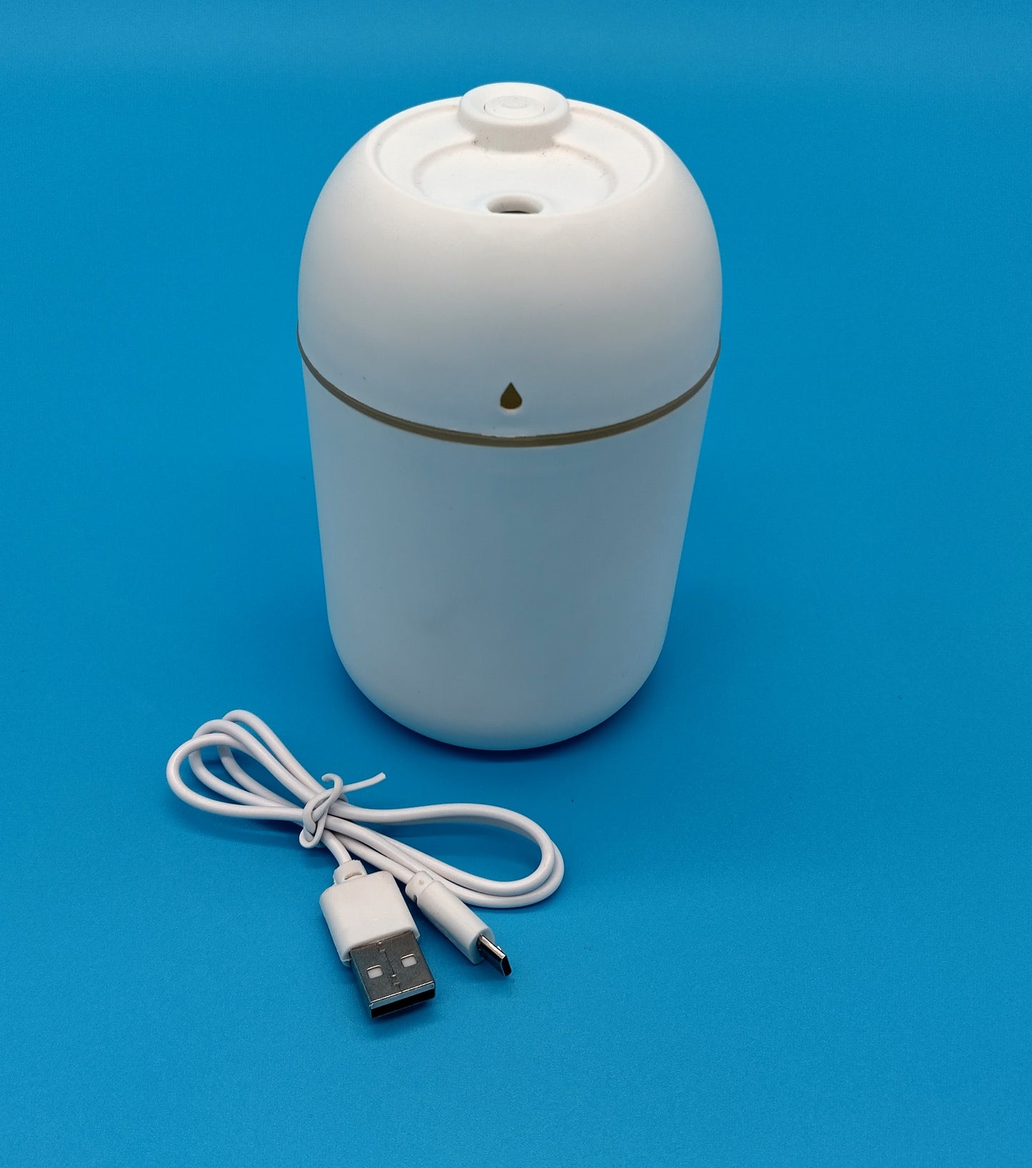 Mini Humidifier. 330ml. Improve your air quality and enjoy a comfortable environment with the Mini Humidifier for Bedroom.