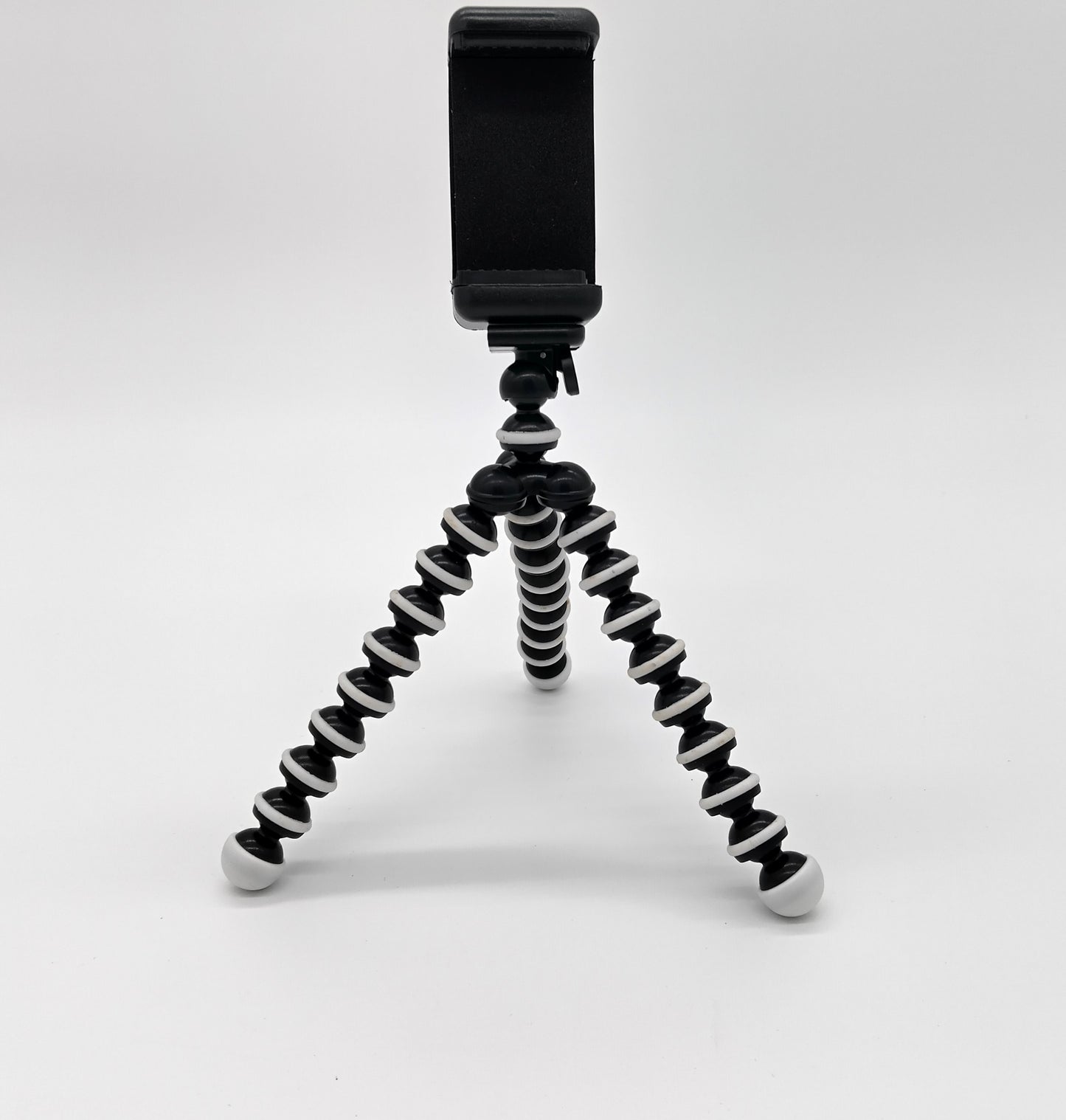 Tripod Stand. Perfect for capturing unique and creative shots with ease and stability.