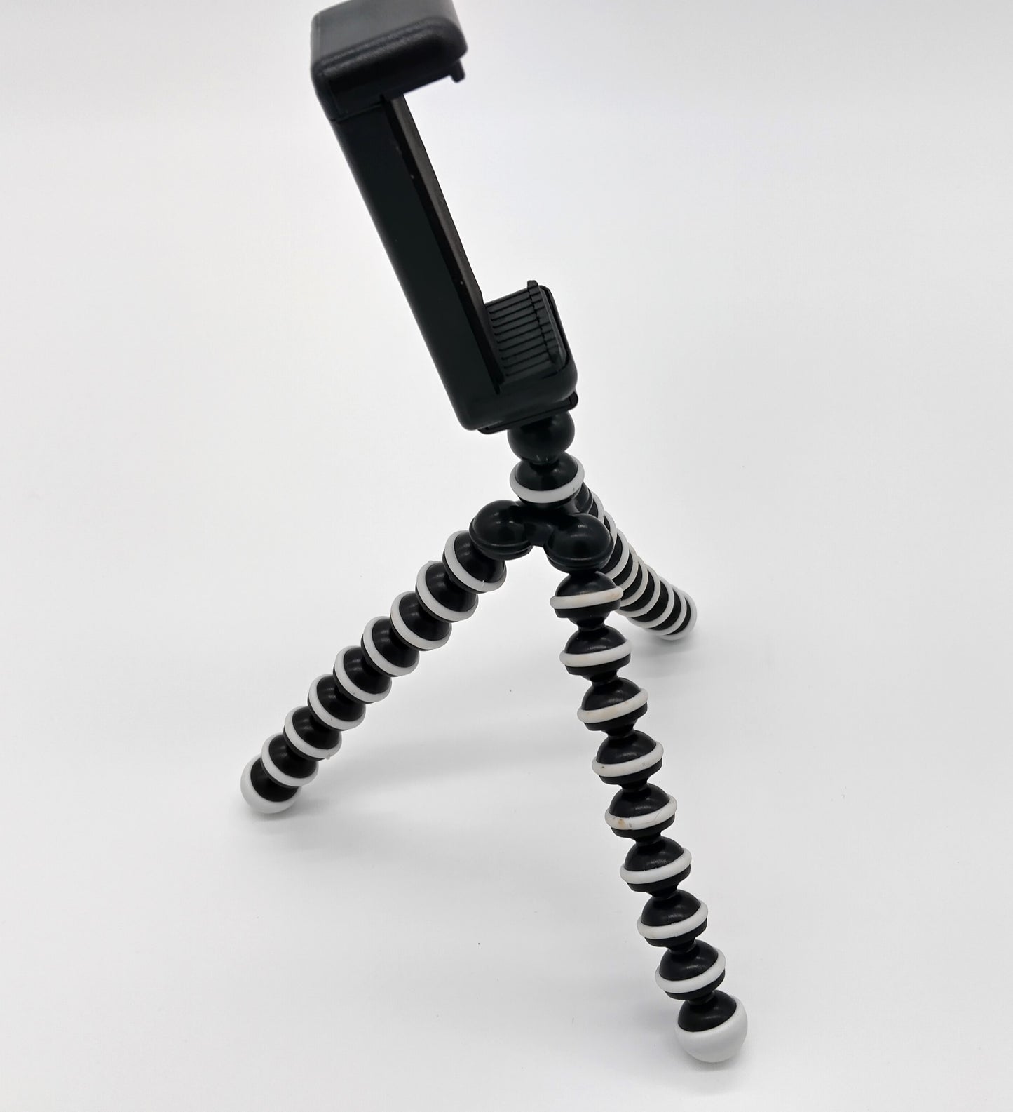 Tripod Stand. Perfect for capturing unique and creative shots with ease and stability.