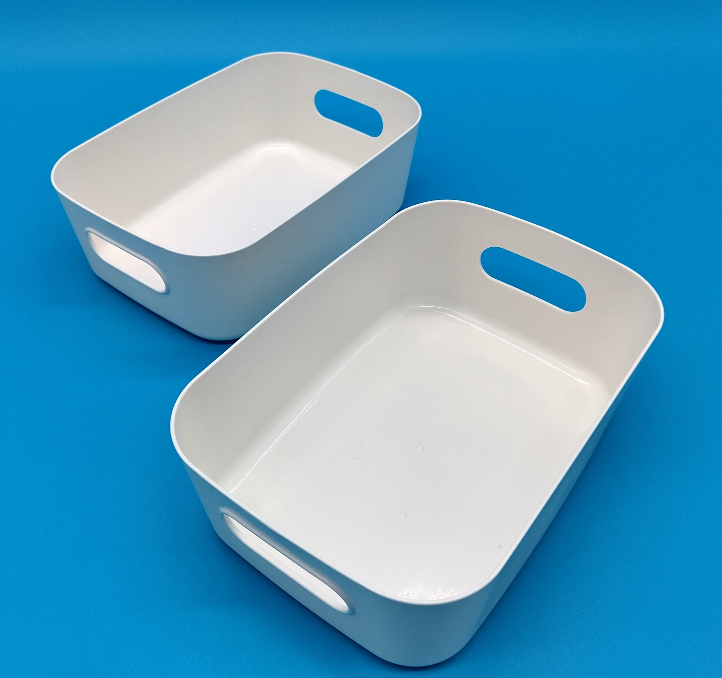 2 Pcs. Plastic Storage Boxes. Enhance your organization with our Set of 2 Small Plastic Storage Baskets.