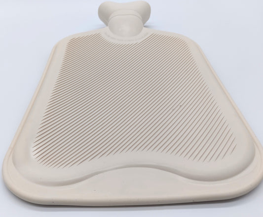 Hot Water Bottle. 2 Litre. Cream. Stay warm and cozy with a touch of elegance.