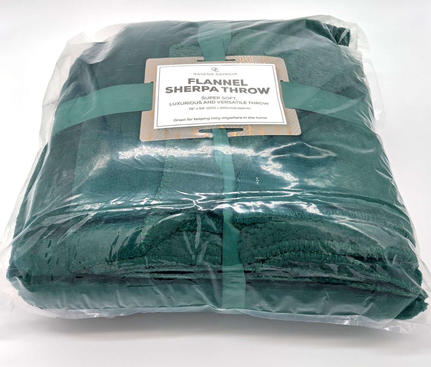 GAVENO CAVAILIA Flannel Sherpa Throw. Experience the ultimate in coziness with the Flannel Sherpa Throw.