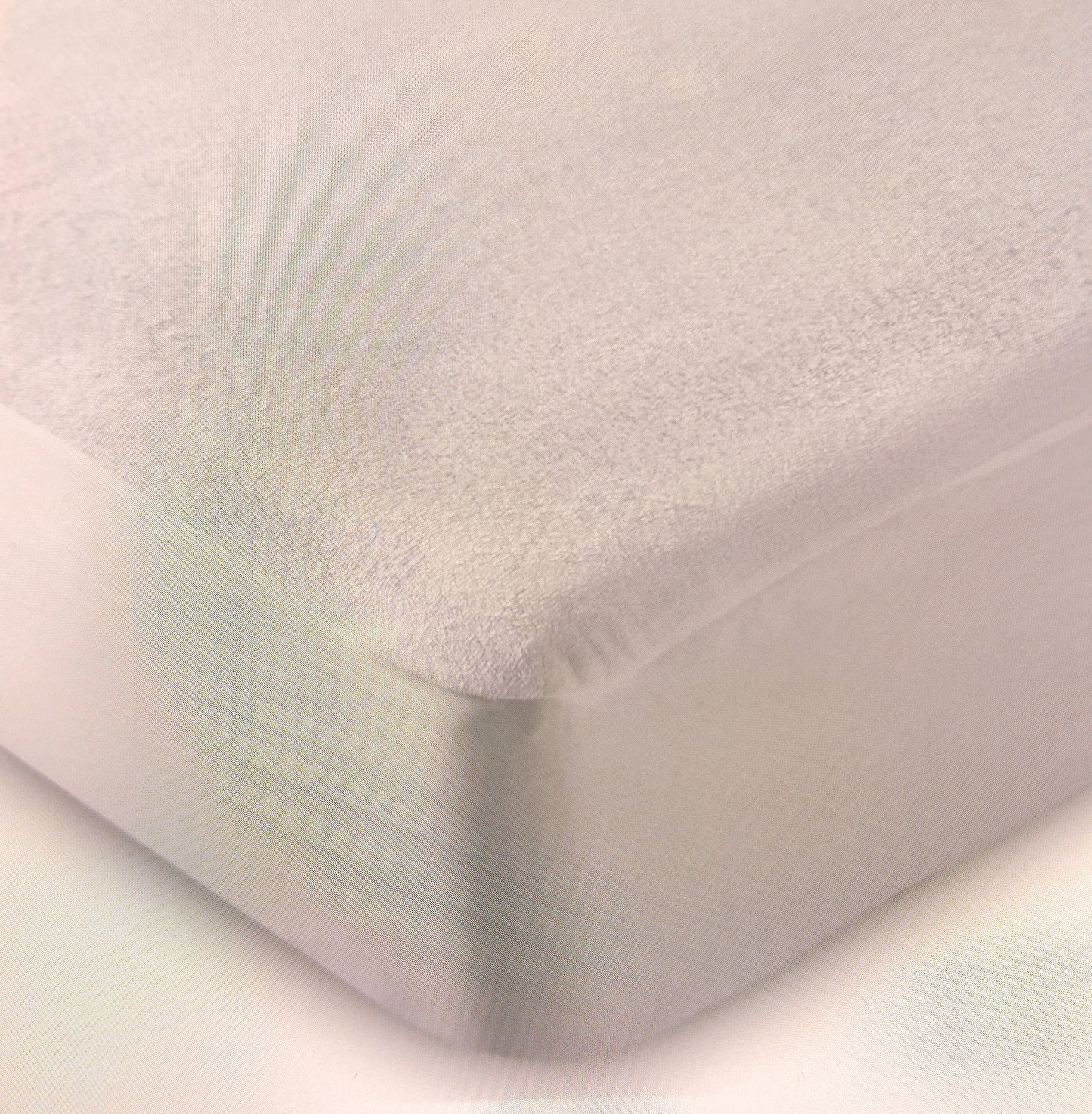 Waterproof Mattress Protector Double Terry Cotton. Give your mattress the protection it deserves while enhancing your sleep comfort.