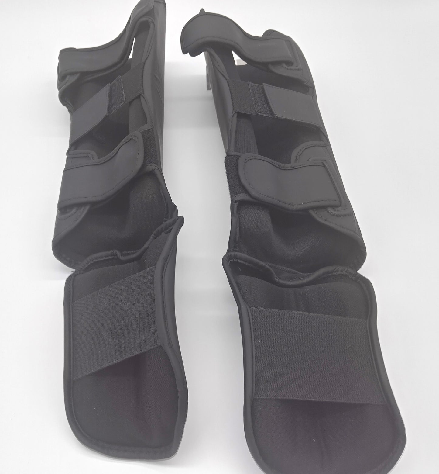 EVO Fitness Matte Black Shin Pads Size S. Order Now and Kick with Confidence!