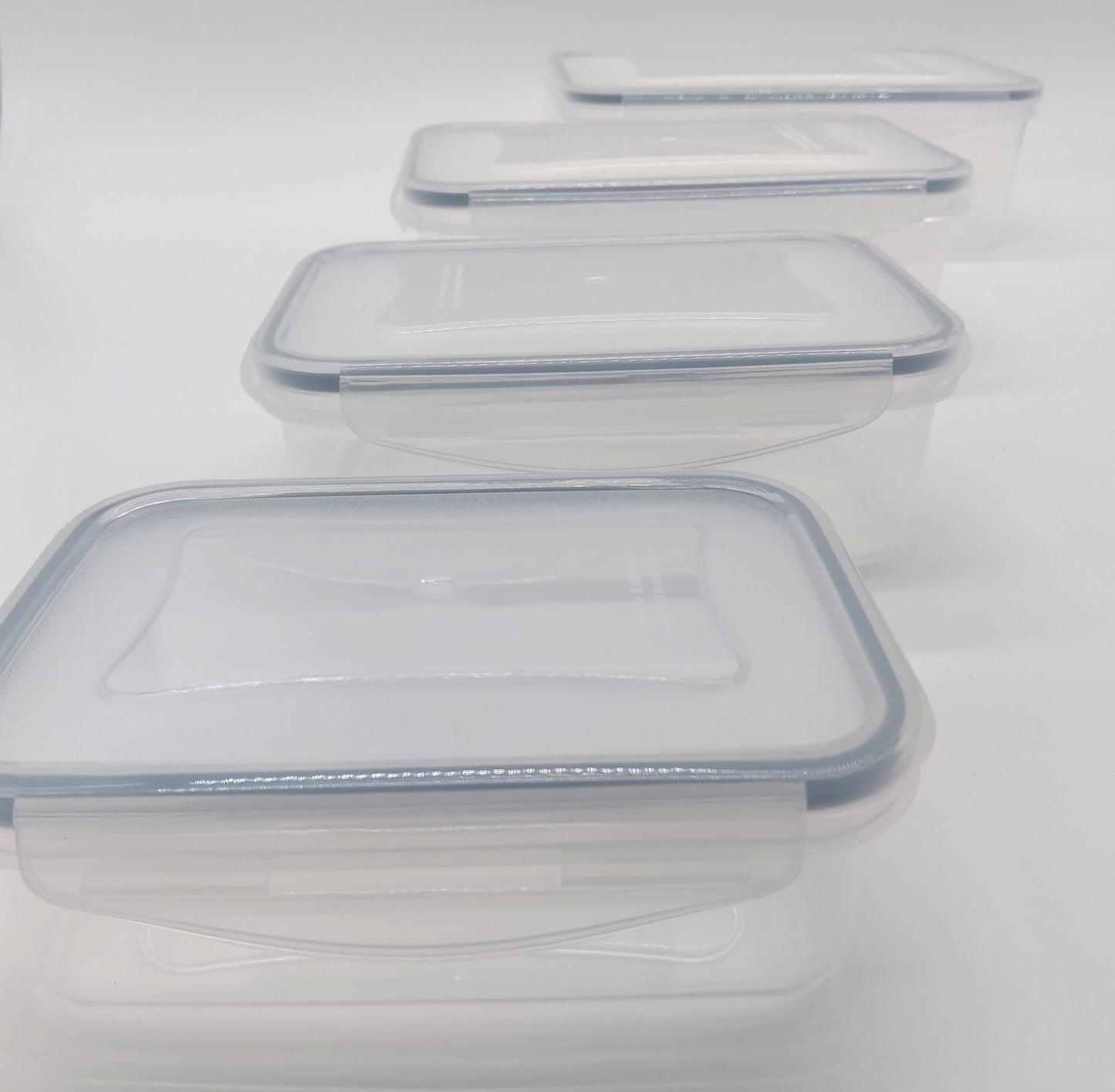 Pack of 4 Food Storage Containers. Transform your kitchen with these practical and stylish food storage containers!