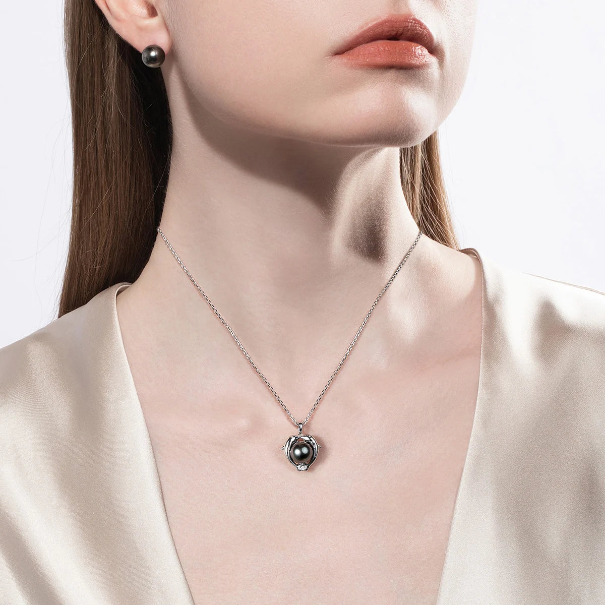 Tahitian Black Pearl Dolphin Necklace.