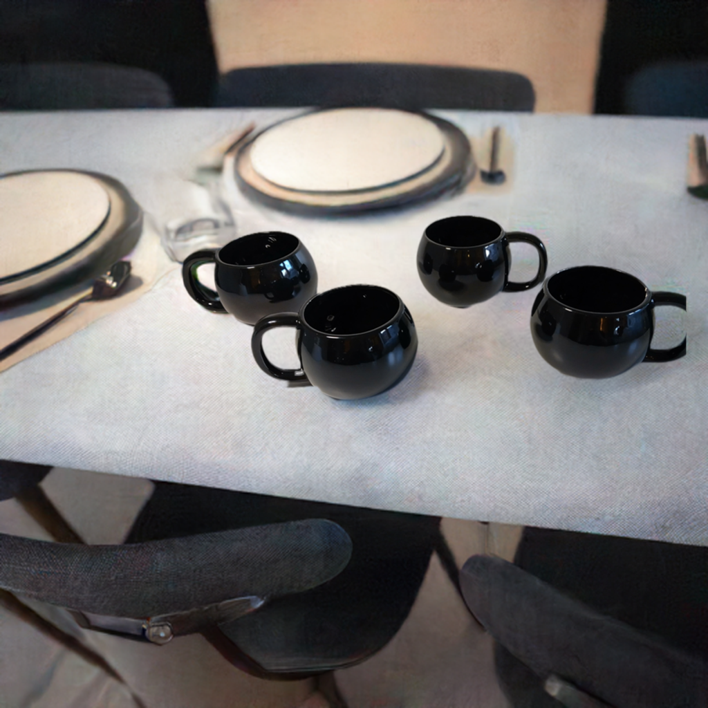 Black Mugs. 4 Pcs. Black.  Add a touch of elegance to your drinkware collection with our 4-piece porcelain mug set.